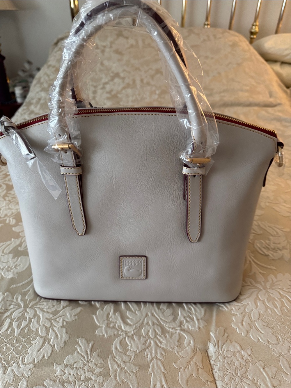Dooney & Bourke Pebble Leather Satchel in Cream with Red Trim